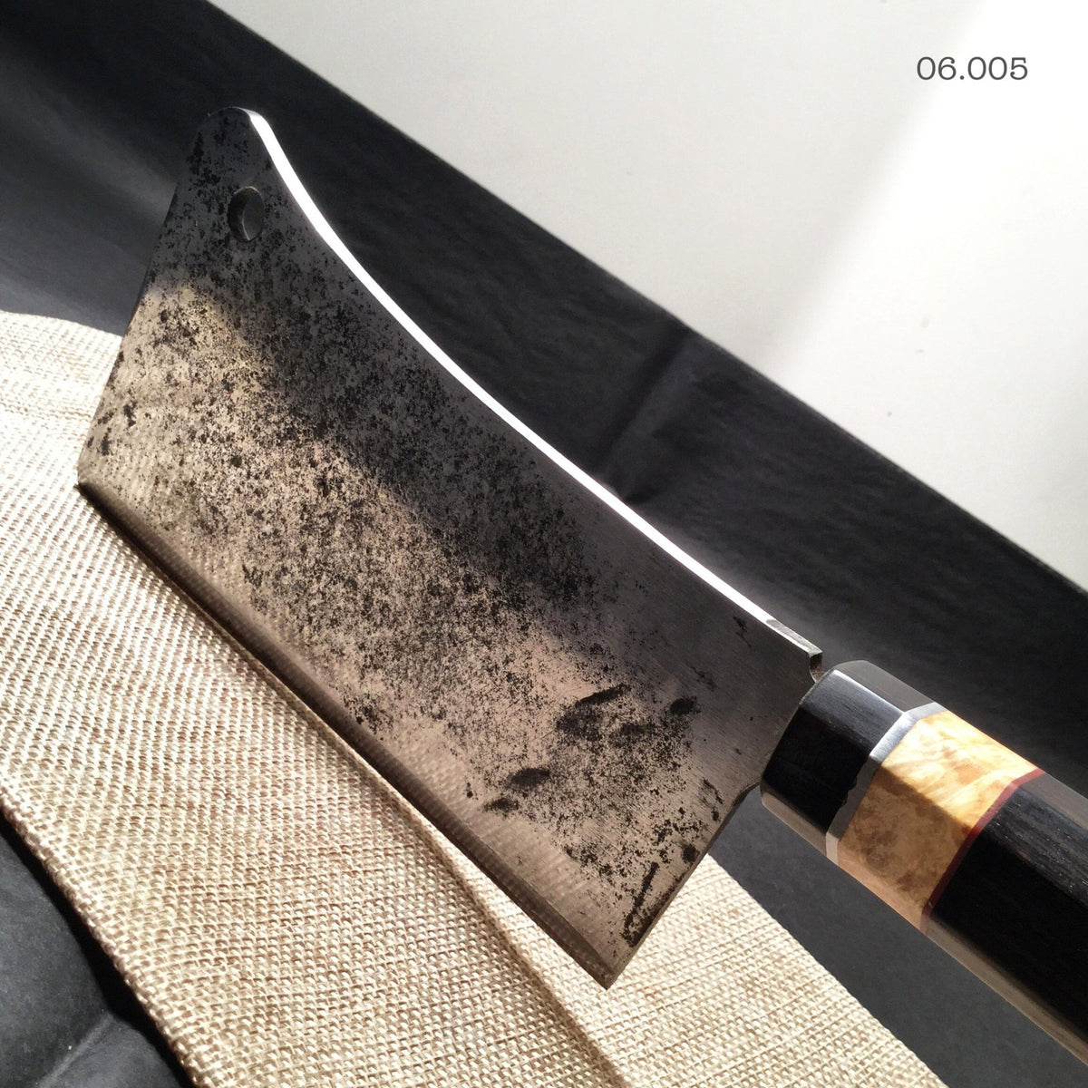 http://www.ironlucky.com/cdn/shop/products/hatchet-hand-forged-kitchen-axe-custom-meat-cleaver-mesozoic-xiii-538946_1200x1200.jpg?v=1583982736